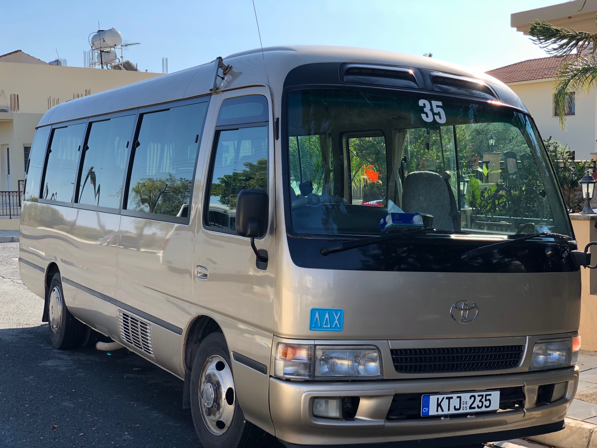 Toyota Coaster 22-seater minibus for excursions and private group travel in Cyprus